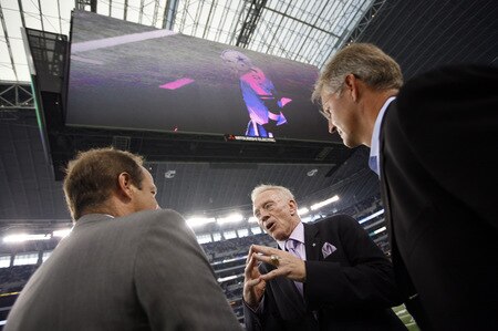 ARLINGTON, TX - AUGUST 21:  Dallas Cowboys team owner Jerry Jones (center) talks with two unidentified individuals before the Cowboys take on the Tennessee Titans during a preseason game at Dallas Cowboys Stadium on August 21, 2009 in Arlington, Texas. <br /><br /><span class="help">(Photo by Tom Pennington/Getty Images)</span>