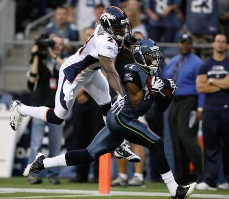 SEATTLE - AUGUST 22:  Wide receiver Deon Butler #11 of the Seattle Seahawks halls in a touchdown catch against Andre Goodman #21 of the Denver Broncos on August 22, 2009 at Qwest Field in Seattle, Washington. <br /><br /><span class="help">(Photo by Otto Greule Jr/Getty Images)</span>