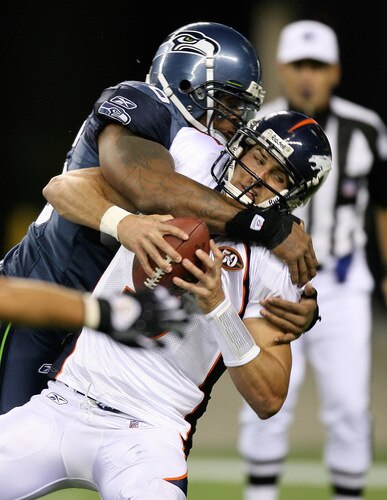 SEATTLE - AUGUST 22:  Quarterback Tom Brandstater #3 of the Denver Broncos is sacked by Michael Bennett #96 of the Seattle Seahawks on August 22, 2009 at Qwest Field in Seattle, Washington.  The Seahawks defeated the Broncos 27-13. <br /><br /><span class="help">(Photo by Otto Greule Jr/Getty Images)</span>