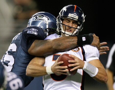 SEATTLE - AUGUST 22:  Quarterback Tom Brandstater #3 of the Denver Broncos is sacked by Michael Bennett #96 of the Seattle Seahawks on August 22, 2009 at Qwest Field in Seattle, Washington.  The Seahawks defeated the Broncos 27-13. <br /><br /><span class="help">(Photo by Otto Greule Jr/Getty Images)</span>