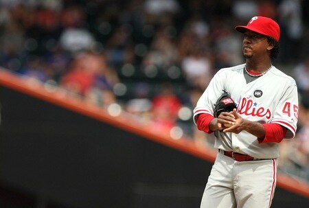NEW YORK - AUGUST 23:  Pedro Martinez #45 of the Philadelphia Phillies looks on against the New York Mets on August 23, 2009 at Citi Field in the Flushing neighborhood of the Queens borough of New York City.  <br /><br /><span class="help">(Photo by Al Bello/Getty Images)</span>