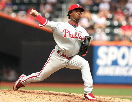 NEW YORK - AUGUST 23:  Pedro Martinez #45 of the Philadelphia Phillies throws a pitch against the New York Mets on August 23, 2009 at Citi Field in the Flushing neighborhood of the Queens borough of New York City.  <br /><br /><span class="help">(Photo by Al Bello/Getty Images)</span>