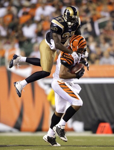 CINCINNATI, OH - AUGUST 27:  Tight end J. P. Foschi #45 of the Cincinnati Bengals runs after the catch against David Roach #27 of the St. Louis Rams during the preseason game at Paul Brown Stadium on August 27, 2009 in Cincinnati, Ohio. <br /><br /><span class="help">(Photo by Andy Lyons/Getty Images)</span>