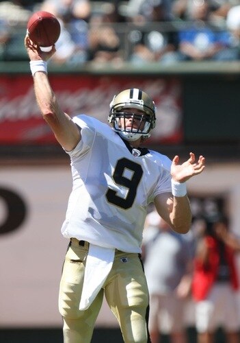 OAKLAND, CA - AUGUST 29: Quarterback Drew Brees #9 of the New Orleans Saints delivers a pass during the preseason game against the Oakland Raiders at Oakland-Alameda County Coliseum on August 29, 2009 in Oakland, California. <br /><br /><span class="help">(Photo by Jed Jacobsohn/Getty Images)</span>