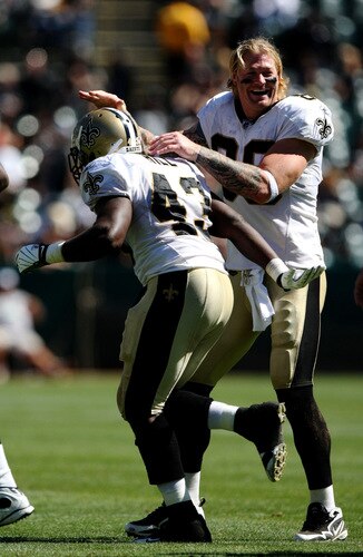OAKLAND, CA - AUGUST 29:  Tight end Jeremy Shockey #88 of the New Orleans Saints celebrates with teammate P.J. Hill #43 during the preseason game against the Oakland Raiders at Oakland-Alameda County Coliseum on August 29, 2009 in Oakland, California. <br /><br /><span class="help">(Photo by Jed Jacobsohn/Getty Images)</span>
