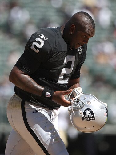OAKLAND, CA - AUGUST 29:  Quarterback JaMarcus Russell #2 of the Oakland Raiders looks on against the New Orleans Saints during an NFL preseason game at Oakland-Alameda County Coliseum on August 29, 2009 in Oakland, California.  <br /><br /><span class="help">(Photo by Jed Jacobsohn/Getty Images)</span>