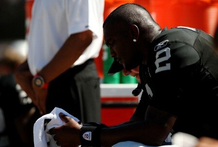 OAKLAND, CA - AUGUST 29: Quarterback JaMarcus Russell #2 of the Oakland Raiders sits on the bench during the preseason game against the New Orleans Saints at Oakland-Alameda County Coliseum on August 29, 2009 in Oakland, California. <br /><br /><span class="help">(Photo by Jed Jacobsohn/Getty Images)</span>