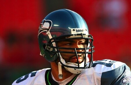 KANSAS CITY, MO - AUGUST 29:  Seneca Wallace #15 of looks on during warm ups against the Kansas City Chiefs during their preseason game at Arrowhead Stadium on August 29, 2009 in Kansas City, Missouri. <br /><br /><span class="help">(Photo by Dilip Vishwanat/Getty Images)</span>