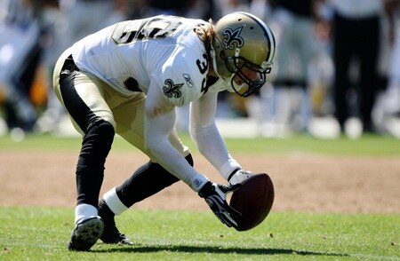 OAKLAND, CA - AUGUST 29:  Safety Chris Reis #39 of the New Orleans Saints picks up a fumble during the preseason game against the Oakland Raiders at Oakland-Alameda County Coliseum on August 29, 2009 in Oakland, California. <br /><br /><span class="help">(Photo by Jed Jacobsohn/Getty Images)</span>