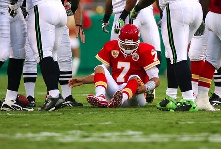 KANSAS CITY, MO - AUGUST 29: Quarterback Matt Cassel #7 of the Kansas City Chiefs grimaces as he grabs his left leg after he was sacked in the first quarter by Brandon Mebane #92 of the Seattle Seahawks during their preseason game at Arrowhead Stadium on August 29, 2009 in Kansas City, Missouri. <br /><br /><span class="help">(Photo by Dilip Vishwanat/Getty Images)</span>