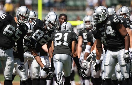 OAKLAND, CA - AUGUST 29:  Nnamdi Asomugha #21 of the Oakland Raiders is introduced against the New Orleans Saints during an NFL preseason game at Oakland-Alameda County Coliseum on August 29, 2009 in Oakland, California.  <br /><br /><span class="help">(Photo by Jed Jacobsohn/Getty Images)</span>