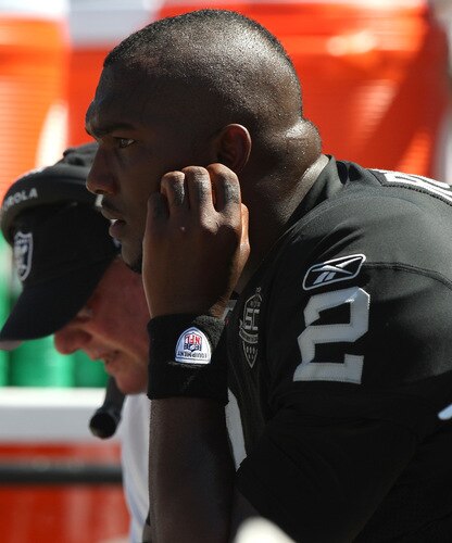 OAKLAND, CA - AUGUST 29:  Quarterback JaMarcus Russell #2 of the Oakland Raiders looks on against the New Orleans Saints during an NFL preseason game at Oakland-Alameda County Coliseum on August 29, 2009 in Oakland, California.  <br /><br /><span class="help">(Photo by Jed Jacobsohn/Getty Images)</span>