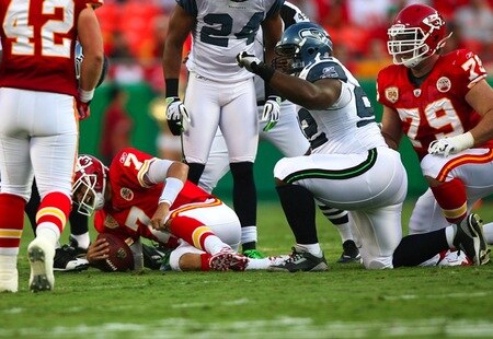 KANSAS CITY, MO - AUGUST 29: Quarterback Matt Cassel #7 of the Kansas City Chiefs grimaces as he grabs his left leg after he was sacked in the first quarter by Brandon Mebane #92 of the Seattle Seahawks during their preseason game at Arrowhead Stadium on August 29, 2009 in Kansas City, Missouri. <br /><br /><span class="help">(Photo by Dilip Vishwanat/Getty Images)</span>