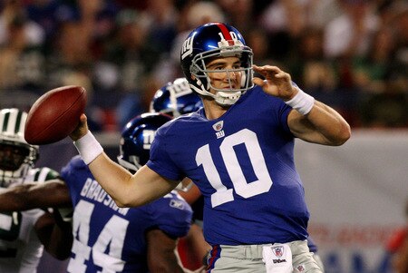 EAST RUTHERFORD, NJ - AUGUST 29:  Quarterback Eli Manning #10 of the New York Giants throws a pass during a preseason game against the New York Jets at Giants Stadium on August 29, 2009 in East Rutherford, New Jersey.  <br /><br /><span class="help">(Photo by Jim McIsaac/Getty Images)</span>