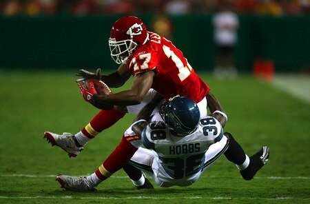 KANSAS CITY, MO - AUGUST 29: Ashley Lelie #17 of the Kansas City Chiefs makes a reception against Kevin Hobbs #38 of the Seattle Seahawks during their preseason game at Arrowhead Stadium on August 29, 2009 in Kansas City, Missouri. <br /><br /><span class="help">(Photo by Dilip Vishwanat/Getty Images)</span>