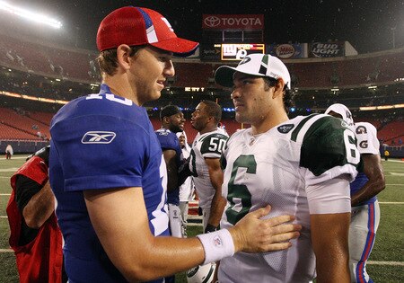 EAST RUTHERFORD, NJ - AUGUST 29:  Eli Manning #10 of the New York Giants talks with Mark Sanchez #6 of the New York Jets after their game on August 29, 2009 at Giants Stadium in East Rutherford, New Jersey.  <br /><br /><span class="help">(Photo by Jim McIsaac/Getty Images)</span>