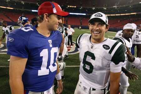 EAST RUTHERFORD, NJ - AUGUST 29:  Eli Manning #10 of the New York Giants talks with Mark Sanchez #6 of the New York Jets after their game on August 29, 2009 at Giants Stadium in East Rutherford, New Jersey.  <br /><br /><span class="help">(Photo by Jim McIsaac/Getty Images)</span>