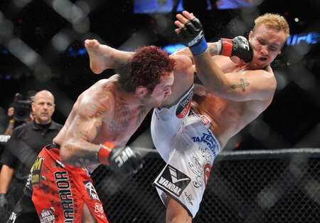 PORTLAND, OR - AUGUST 29:  UFC fighter Chris Leben (L) battles UFC fighter Jake Rosholt (R) during their Middleweight bout at UFC 102:  Couture vs. Nogueira at the Rose Garden Arena on August 29, 2009 in Portland, Oregon.  <br /><br /><span class="help">(Photo by Jon Kopaloff/Getty Images)</span>