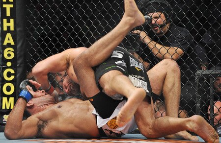 PORTLAND, OR - AUGUST 29:  UFC fighter Randy Couture (Bottom) battles UFC fighter Antonio Nogueira (Top) during their Heavyweight bout at UFC 102:  Couture vs. Nogueira at the Rose Garden Arena on August 29, 2009 in Portland, Oregon.  <br /><br /><span class="help">(Photo by Jon Kopaloff/Getty Images)</span>