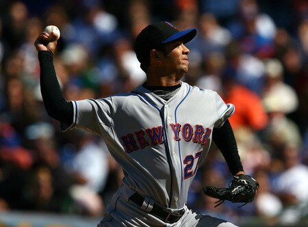 CHICAGO - AUGUST 30: Starting pitcher Nelson Figueroa #27 of the New York Mets delivers the ball against the Chicago Cubs on August 30, 2009 at Wrigley Field in Chicago, Illinois. <br /><br /><span class="help">(Photo by Jonathan Daniel/Getty Images)</span>