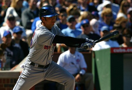CHICAGO - AUGUST 30: Starting pitcher Nelson Figueroa #27 of the New York Mets hits a single against the Chicago Cubs on August 30, 2009 at Wrigley Field in Chicago, Illinois. <br /><br /><span class="help">(Photo by Jonathan Daniel/Getty Images)</span>