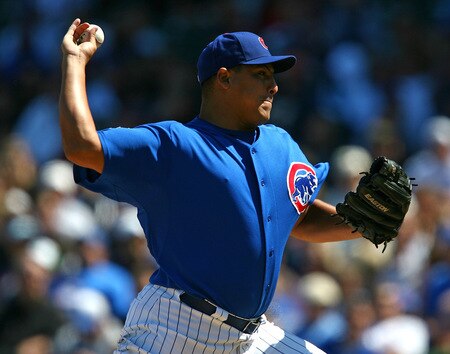 CHICAGO - AUGUST 30: Starting pitcher Carlos Zambrano #38 of the Chicago Cubs delivers the ball against the New York Mets on August 30, 2009 at Wrigley Field in Chicago, Illinois. <br /><br /><span class="help">(Photo by Jonathan Daniel/Getty Images)</span>