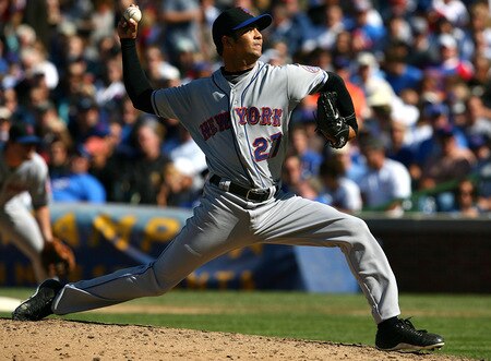 CHICAGO - AUGUST 30: Starting pitcher Nelson Figueroa #27 of the New York Mets delivers the ball against the Chicago Cubs on August 30, 2009 at Wrigley Field in Chicago, Illinois. <br /><br /><span class="help">(Photo by Jonathan Daniel/Getty Images)</span>