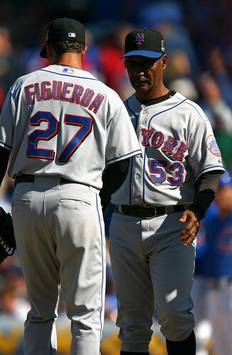 CHICAGO - AUGUST 30: Manager Jerry Manuel #53 of the New York Mets removes starting pitcher Nelson Figueroa #27 from a game against the Chicago Cubs on August 30, 2009 at Wrigley Field in Chicago, Illinois. The Mets defeated the Cubs 4-1. <br /><br /><span class="help">(Photo by Jonathan Daniel/Getty Images)</span>