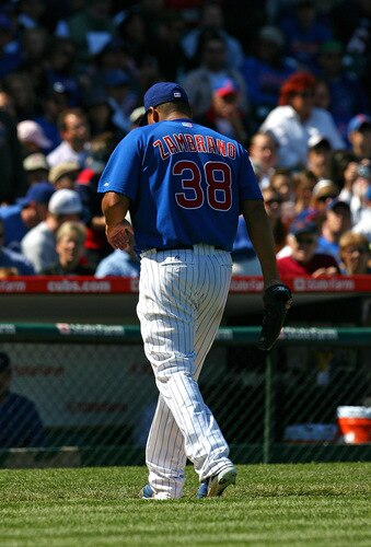 CHICAGO - AUGUST 30: Starting pitcher Carlos Zambrano #38 of the Chicago Cubs walks to the dugout after beiong removed from a game against the New York Mets in the 4th inning on August 30, 2009 at Wrigley Field in Chicago, Illinois. The Mets defeated the Cubs 4-1. <br /><br /><span class="help">(Photo by Jonathan Daniel/Getty Images)</span>