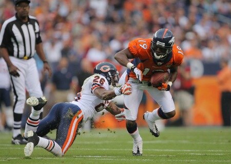DENVER - AUGUST 30:  Wide receiver Eddie Royal #19 of the Denver Broncos runs with the ball against Trumaine McBride #26 of the Chicago Bears during the preseason game at INVESCO Field at Mile High on August 30, 2009 in Denver, Colorado.  <br /><br /><span class="help">(Photo by Doug Pensinger/Getty Images)</span>