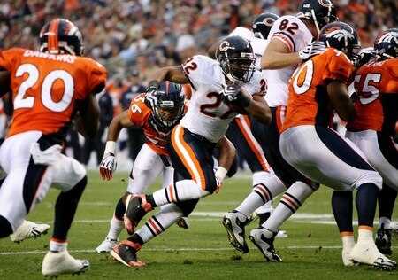 DENVER - AUGUST 30:  Running back Matt Forte #22 of the Chicago Bears rushes past Josh Barrett #36 of the Denver Broncos to the one yard line during the second quarter at INVESCO Field at Mile High on August 30, 2009 in Denver, Colorado.  <br /><br /><span class="help">(Photo by Doug Pensinger/Getty Images)</span>