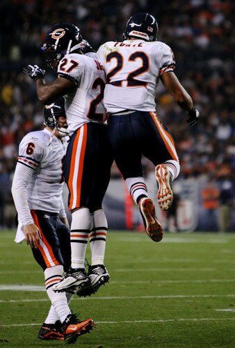 DENVER - AUGUST 30: Running back Matt Forte #22 (R) of the Chicago Bears celebrates his touchdown with teammates (L-R) Jay Cutler #6 and Kevin Jones #27 during the second quarter against the Denver Broncos at INVESCO Field at Mile High on August 30, 2009 in Denver, Colorado. <br /><br /><span class="help">(Photo by Doug Pensinger/Getty Images)</span>