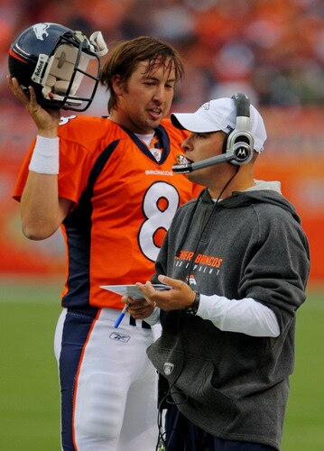 DENVER - AUGUST 30:  Head Coach Josh McDaniels (L) of the Denver Broncos talks to his quarterback Kyle Orton #8 (R) during the preseason game against the Chicago Bears at INVESCO Field at Mile High on August 30, 2009 in Denver, Colorado.  <br /><br /><span class="help">(Photo by Doug Pensinger/Getty Images)</span>