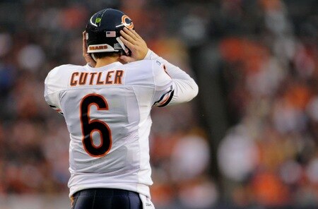 DENVER - AUGUST 30: Quarterback Jay Cutler #6 of the Chicago Bears has trouble hearing the play in his headset during the preseason game against the Denver Broncos at INVESCO Field at Mile High on August 30, 2009 in Denver, Colorado. <br /><br /><span class="help">(Photo by Doug Pensinger/Getty Images)</span>
