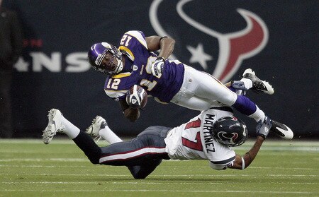 HOUSTON - AUGUST 31:  Marcus McCauley #21 of the Minnesota Vikings his tackled by Glenn Martinez #17 of  the Houston Texans on the opening kick-off at Reliant Stadium on August 31, 2009 in Houston, Texas.  <br /><br /><span class="help">(Photo by Bob Levey/Getty Images)</span>