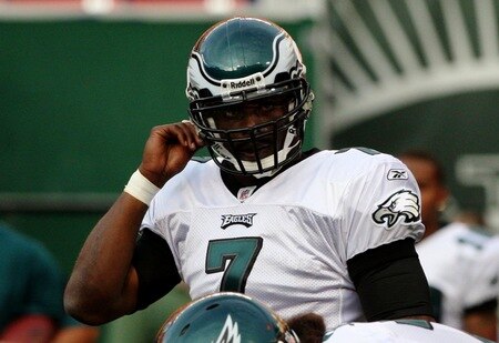 EAST RUTHERFORD, NJ - SEPTEMBER 3:  Quarterback Michael Vick #7 of the Philadelphia Eagles looks on from behind center during warm-up prior to the NFL preseason game against the New York Jets at Giants Stadium on September 3, 2009 in East Rutherford, New Jersey. <br /><br /><span class="help">(Photo by Jim McIsaac/Getty Images)</span>