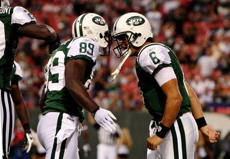 EAST RUTHERFORD, NJ - SEPTEMBER 3:  Quarterback MarkSanchez #6 and wide receiver Jerricho Cotchery #89 of the New York Jets celebrate a first quarter touchdown against the Philadelphia Eagles during the NFL preseason game at Giants Stadium on September 3, 2009 in East Rutherford, New Jersey. <br /><br /><span class="help">(Photo by Jim McIsaac/Getty Images)</span>