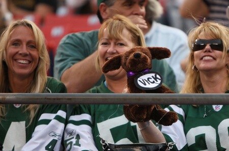 EAST RUTHERFORD, NJ - SEPTEMBER 3:  New York Jets fans hold up a stuffed animal in protest against quarterback Michael Vick of the Philadelphia Eagles (not in photo) during the NFL preseason game between the Philadelphia Eagles and the New York Jets at Giants Stadium on September 3, 2009 in East Rutherford, New Jersey. <br /><br /><span class="help">(Photo by Jim McIsaac/Getty Images)</span>