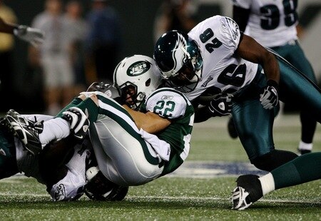EAST RUTHERFORD, NJ - SEPTEMBER 3:  Safety Sean Jones #26 of the Philadelphia Eagles lowers his shoulder for a hit on Danny Woodhead #22 of the New York Jets during the NFL preseason game at Giants Stadium on September 3, 2009 in East Rutherford, New Jersey. <br /><br /><span class="help">(Photo by Jim McIsaac/Getty Images)</span>