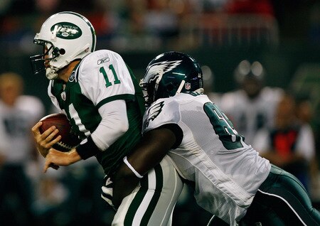 EAST RUTHERFORD, NJ - SEPTEMBER 3: Kellen Clemens #11 of the New York Jets  is sacked by Josh Gaines #65 of the Philadelphia Eagles during the game against the on September 3, 2009 at Giants Stadium in East Rutherford, New Jersey. <br /><br /><span class="help">(Photo by Jared Wickerham/Getty Images)</span>
