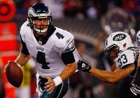 EAST RUTHERFORD, NJ - SEPTEMBER 3: Kevin Kolb #4 of the Philadelphia Eagles scambles away from Eric Smith #33 of the Philadelphia Eagles during the game on September 3, 2009 at Giants Stadium in East Rutherford, New Jersey. <br /><br /><span class="help">(Photo by Jared Wickerham/Getty Images)</span>