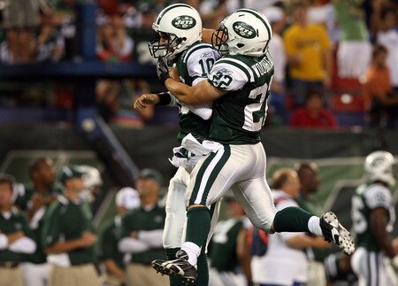 EAST RUTHERFORD, NJ - SEPTEMBER 03:  Erik Ainge #10 and Danny Woodhead #22 of the New York Jets celebrate a touchdown against the Philadelphia Eagles on September 3, 2009 at Giants Stadium in East Rutherford, New Jersey. The Jets defeated the Eagles 38-27.  <br /><br /><span class="help">(Photo by Jim McIsaac/Getty Images)</span>