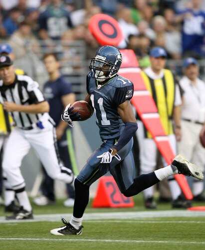 SEATTLE - SEPTEMBER 03:  Wide receiver Deon Butler #11 of the Seattle Seahawks scores a touchdown against the Oakland Raiders on September 3, 2009 at Qwest Field in Seattle, Washington. <br /><br /><span class="help">(Photo by Otto Greule Jr/Getty Images)</span>
