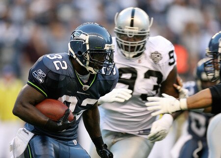 SEATTLE - SEPTEMBER 03:  Running back Edgerrin James  #32 of the Seattle Seahawks rushes against the Oakland Raiders on September 3, 2009 at Qwest Field in Seattle, Washington. <br /><br /><span class="help">(Photo by Otto Greule Jr/Getty Images)</span>