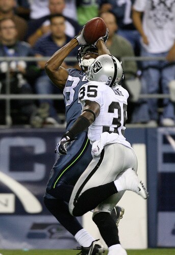 SEATTLE - SEPTEMBER 03:  Wide receiver Benjamin Obomanu #87 of the Seattle Seahawks makes a touchdown catch over John Bowie #35 of the Oakland Raiders on September 3, 2009 at Qwest Field in Seattle, Washington. <br /><br /><span class="help">(Photo by Otto Greule Jr/Getty Images)</span>
