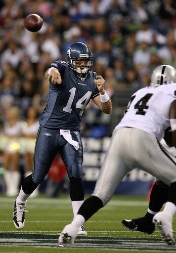 SEATTLE - SEPTEMBER 03:  Quarterback Mike Teel #14 of the Seattle Seahawks passes against the Oakland Raiders on September 3, 2009 at Qwest Field in Seattle, Washington. <br /><br /><span class="help">(Photo by Otto Greule Jr/Getty Images)</span>