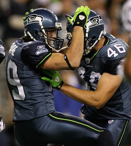 SEATTLE - SEPTEMBER 03:  Wide receiver Logan Payne #19 of the Seattle Seahawks celebrates with Joe Newton #46 after scoring a touchdown against the Oakland Raiders on September 3, 2009 at Qwest Field in Seattle, Washington. The Seahawks defeated the Raiders 31-21. <br /><br /><span class="help">(Photo by Otto Greule Jr/Getty Images)</span>