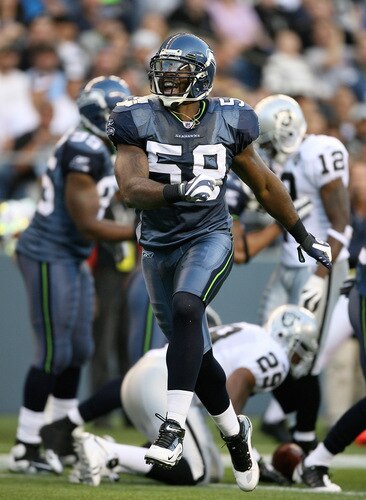 SEATTLE - SEPTEMBER 03:  Linebacker Aaron Curry #59 of the Seattle Seahawks celebrates after tackling running back Michael Bush #29 of the Oakland Raiders on September 3, 2009 at Qwest Field in Seattle, Washington. The Seahawks defeated the Raiders 31-21. <br /><br /><span class="help">(Photo by Otto Greule Jr/Getty Images)</span>