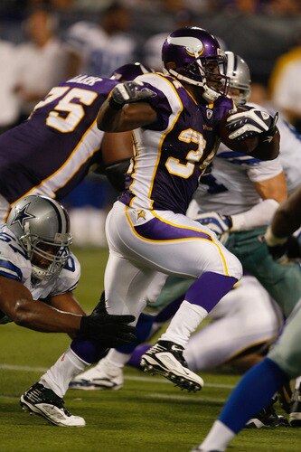 MINNEAPOLIS, MN - SEPTEMBER 4:  Running back Albert Young #34 of the Minnesota Vikings runs with the football against the Dallas Cowboys at Hubert H. Humphrey Metrodome on September 4, 2009 in Minneapolis, Minnesota. The Cowboys defeated the Vikings 35-31. <br /><br /><span class="help">(Photo by Scott Boehm/Getty Images)</span>