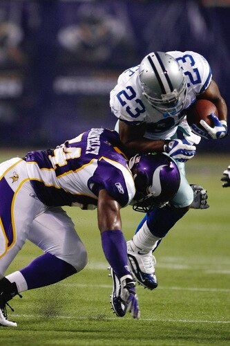 MINNEAPOLIS, MN - SEPTEMBER 4: Running back Tashard Choice #23 of the Dallas Cowboys runs with the football as he is hit by linebacker Jasper Brinkley #54 of the Minnesota Vikings at Hubert H. Humphrey Metrodome on September 4, 2009 in Minneapolis, Minnesota. <br /><br /><span class="help">(Photo by Scott Boehm/Getty Images)</span>